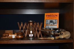 A selection of vintage treen, including biscuit press and pie wheel etc and a silver plated