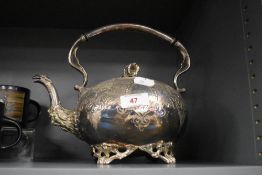 A 19th century silver plated teapot, having spout in the form of an eagles head or similar.