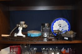 A collection of kitchenalia, including piping set, mincer and scales.