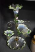 A Victorian glass epergne, having fluted trumpets and bowl to foot of green edged opaque and clear