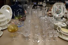 A variety of glass, including vintage coloured cut glass set, rummers, sherry glasses and decanter.