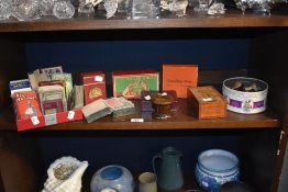 A variety of vintage games, including travelling chess, puzzle knots, card games , playing cards