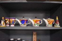 A collection of Art Deco pottery in the style of Clarice Cliff, including Chelsea Works Burslem