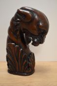 An interesting carved mahogany panther bust, having acanthus detail to base.