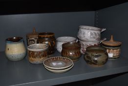A variety of Ambleside pottery, including soup dishes, jug, lidded preserve pots and pin dishes.