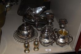 A collection of vintage plated ware, including candlestick and cruet, also included is a pewter
