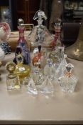 A selection of glass, including vintage ink well, decorative cut glass perfume bottles, decanters of