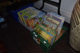Two boxes of Rupert bear books.
