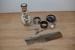 A hallmarked silver pinch pot and spoon, napkin ring with monogrammed 'Billy' and a comb, also