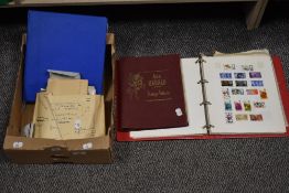 A collection of stamps, including first day covers, partially filled albums etc, including one empty