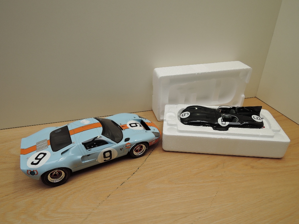 A Classic Model Replica diecast, Ford GT40, in racing trim number 9 along with a diecast 1:18