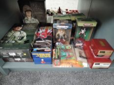 A shelf of modern collectables including Britains Zulu War 20180 Set, Side Show John Wayne
