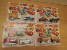 Four 1975 Matchbox 75 Two Packs, TP1 Mercedes Truck & Trailer, TP2 Police Car and Fire Engine, TP3