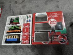 A LGB 70301 G Scale Train Set comprising, 0-4-0 Loco, Carriage, Flat Wagon with Tipper Truck,