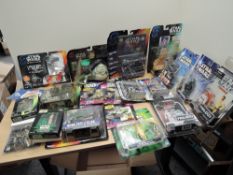A collection of Star Wars figures and accessories including Hasbro Trilogy Collection Figures x3,