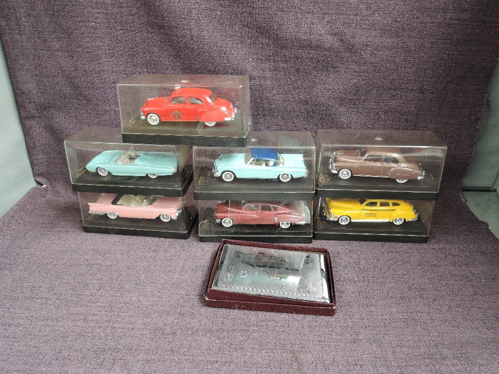 Seven Solido diecasts, 4500 Cadillac, 4508 Chevrolet, 4514 Chrysler Taxi, 4517 Ford Thunderbird,