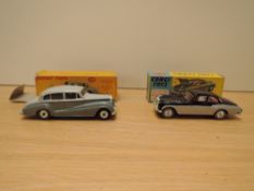 A Corgi diecast, 224 Bentley Continental Sports Saloon, two tone black and silver with red interior,