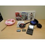 A Nintendo Game Boy Advance with two games Spyro Season Ice and Crash Bandicot XS, power lead, XEH