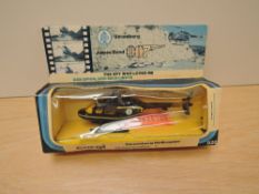 A Corgi diecast, 926 James Bond 007 Stromberg Helicopter from the film The Spy Who Lived Me, rockets