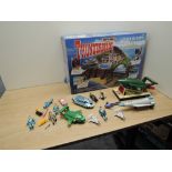 A Matchbox TB710 Thunderbirds Tracy Island Electronic Play Set in original box along with figures