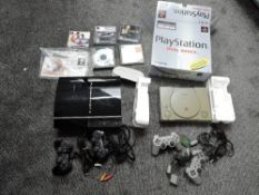 A Sony Play Station Dual Shock Console in original box with two controllers, power lead and memory