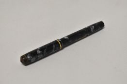 A Conway Stewart 286 lever fill fountain pen in grey marble with single band to the cap having a