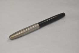 A Sheaffer Imperial II aero fill fountain pen in grey with brushed steel cap, with spot