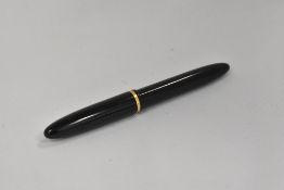 An Evergood button fill fountain pen in black with single band to the cap having Warrented 14ct