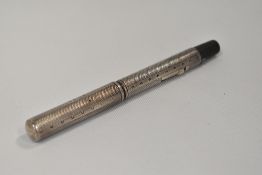 A Conway Stewart lever fill fountain pen with hallmarked silver overlay having Conway Stewart 14ct
