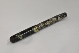 A Nova lever fill fountain pen in green marble with single band to the cap having Burnham 14ct