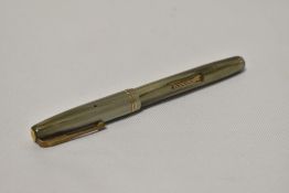 A Waterman 503 lever fill fountain pen in light and dark grey pearl with two narrow bands to the cap