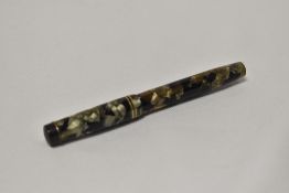 A Conway Stewart 270 lever fill fountain pen in black gold marble with two narrow bands to the cap