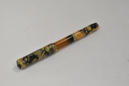 An Avon piston fill fountain pen in pearl and black with broad band to the cap having Dura Tip 4