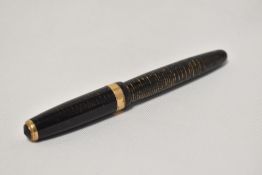 A Parker Vacumatic Major button fill fountain pen in gold pearl with broad decorative band to the