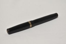 A Mabie Todd twist fill fountain pen in black with one broad and two narrow bands to the cap