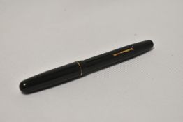 A Mabie Todd Swan 3140 lever fill fountain pen in dark green with single narrow band to the cap