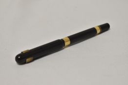 A Mabie Todd The Swan Pen, Eyedropper in BHR with two gold bands to the barrel having Watermans 14ct