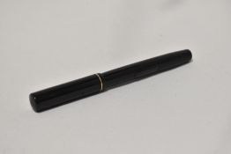 A Mabie Todd Swan SM2/60 lever fill fountain pen in black with single narrow band to the cap