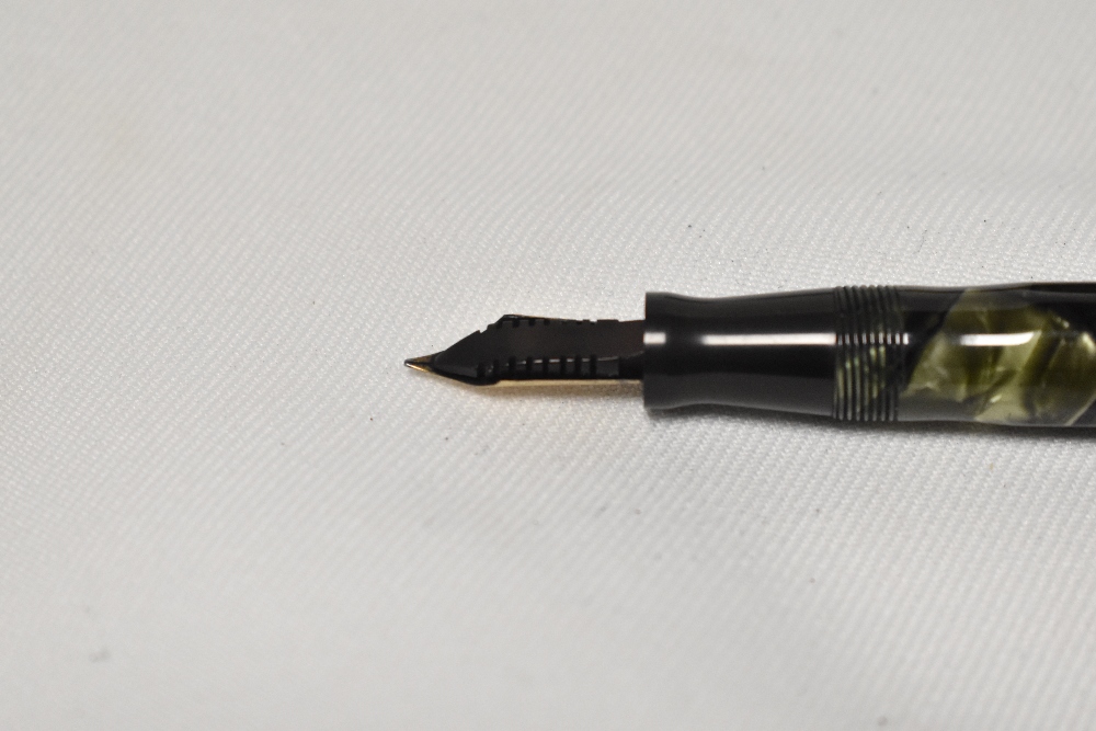 An Eversharp Doric lever fill fountain pen in green marble with dodecahedron faceted cap and barrel, - Image 3 of 4