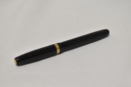 A Waterman W3 lever fill fountain pen in black with broad band to the cap having Waterman 14ct W3