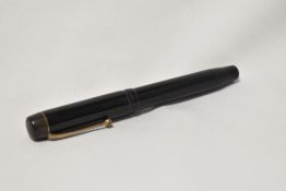 A Mentmore Diploma button fountain pen in black with single narrow band to the cap having Mentmore