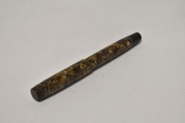 A Parker Victory button fill fountain pen in brown gold hatch having Parker 14k 20 nib.