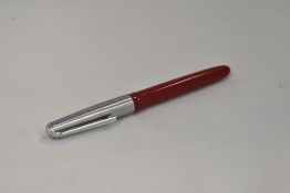 A Platignum Aero fill fountain pen in red with brushed steel cap having a Platignum nib