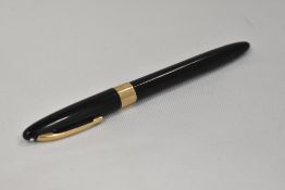 A Sheaffer Valiant snorkel fill fountain pen in black with broad band to the cap having Sheaffer