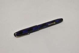 A Conway Stewart 16 lever fill fountain pen in blue black marble with Conway Stewart 14ct nib.