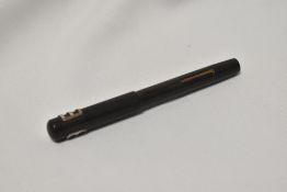 A Lewis's Ltd lever fill fountain pen in BHR having warrented 14ct nib. discoloured