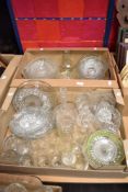 Two cartons of assorted pressed glass and drinking glasses including bowls, cake stands and