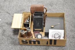 A Claritas 100x200x300 microscope and additional slides, a No.3 Folding Pocket Kodak camera, a
