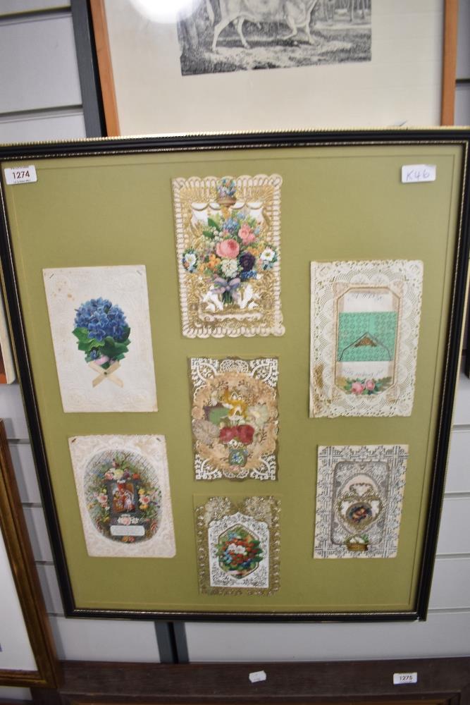 Seven Victorian card mounted in a frame