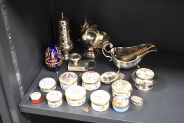 A selection of plated ware and a collection of enamel trinket boxes including Portmeirion
